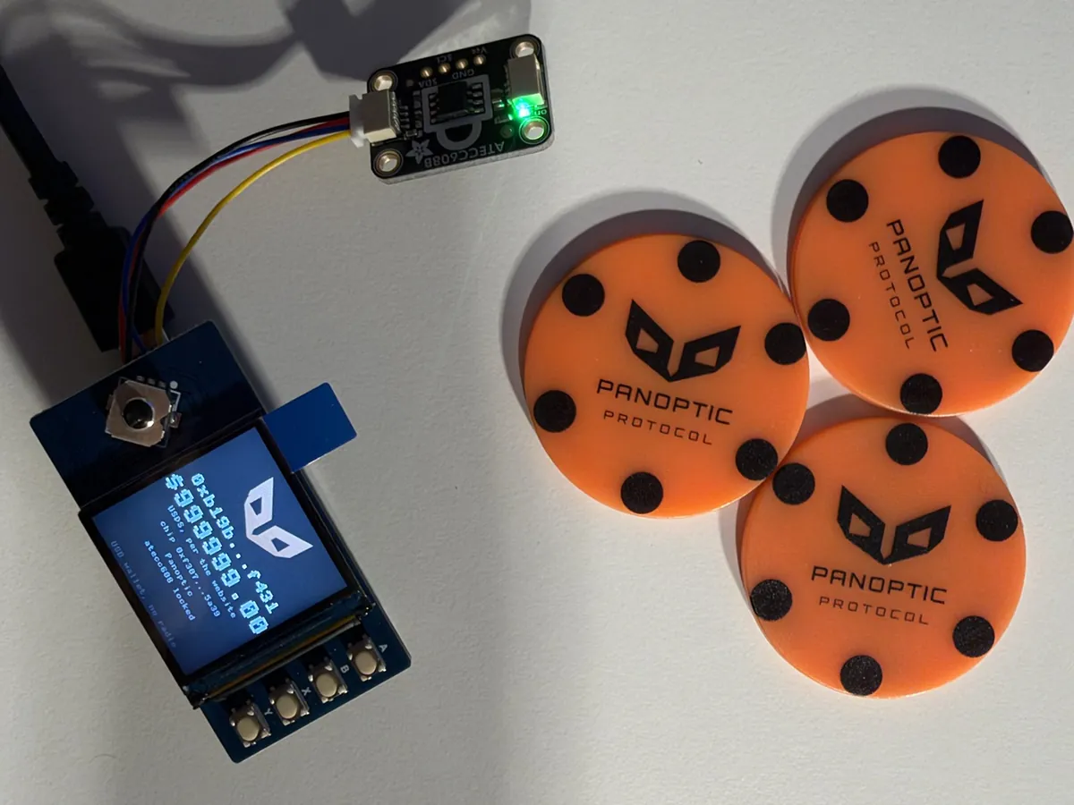 Our hand-built wallet, its screen showing $999999.00 in play USDS on a local test chain, beside three orange Panoptic discs