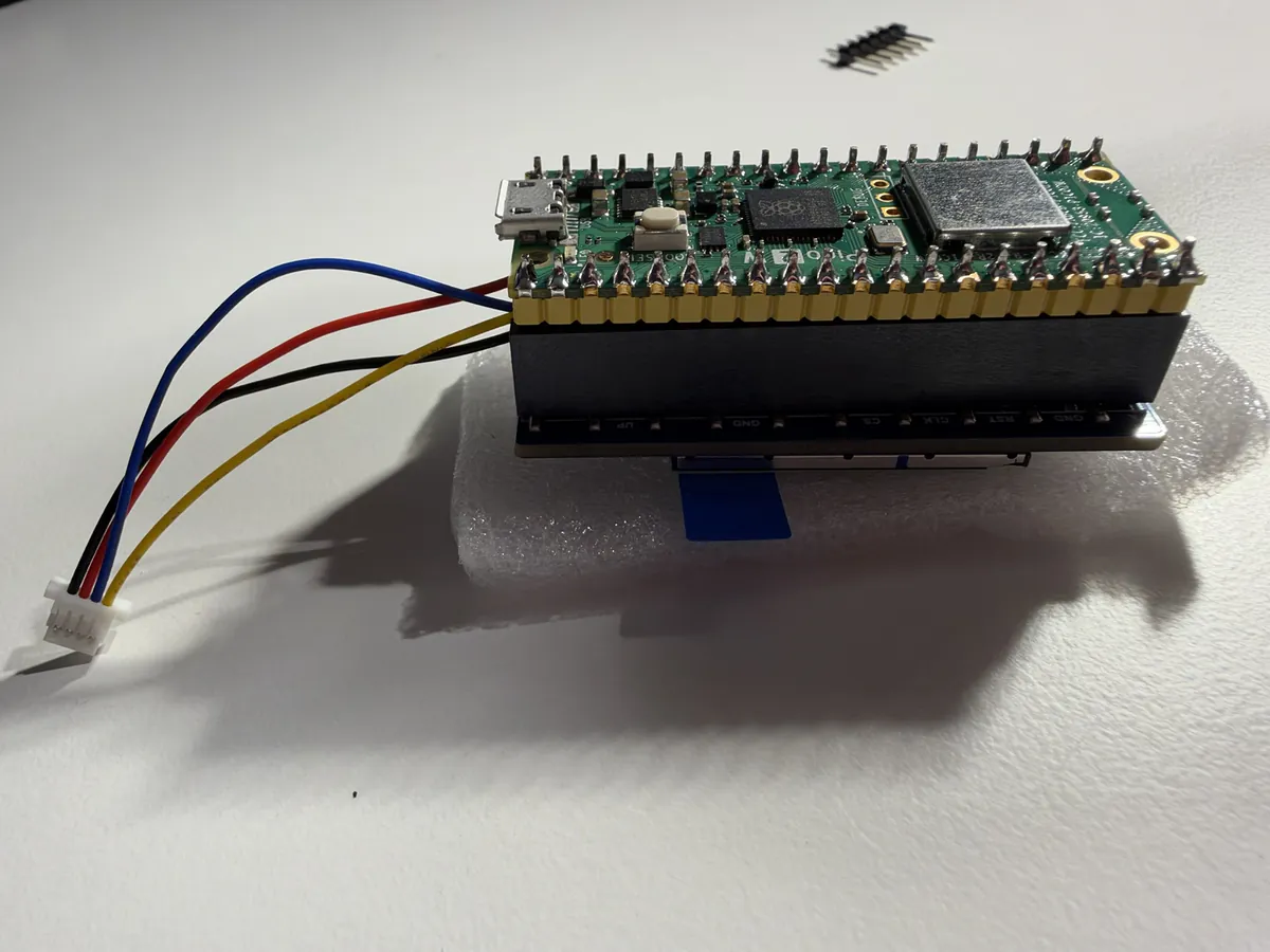 The Pico pressed fully onto the screen board, the wires leading out at the USB end