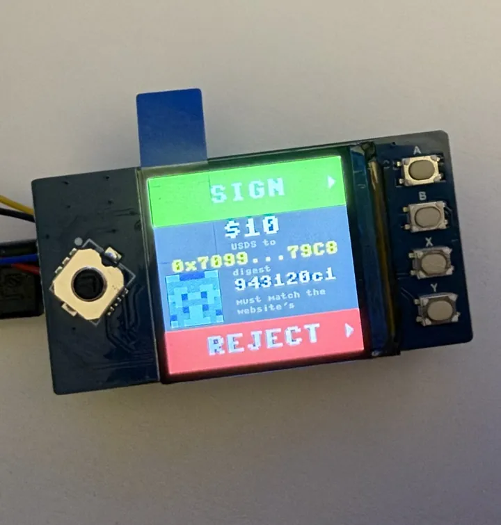 The wallet's SIGN screen: $10 USDS to 0x7099...79C8, the same pixel picture and 943120c1, REJECT below