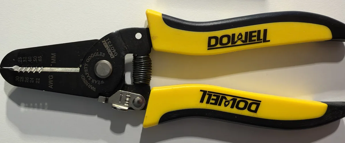 A wire stripper with holes for 22 to 30 AWG
